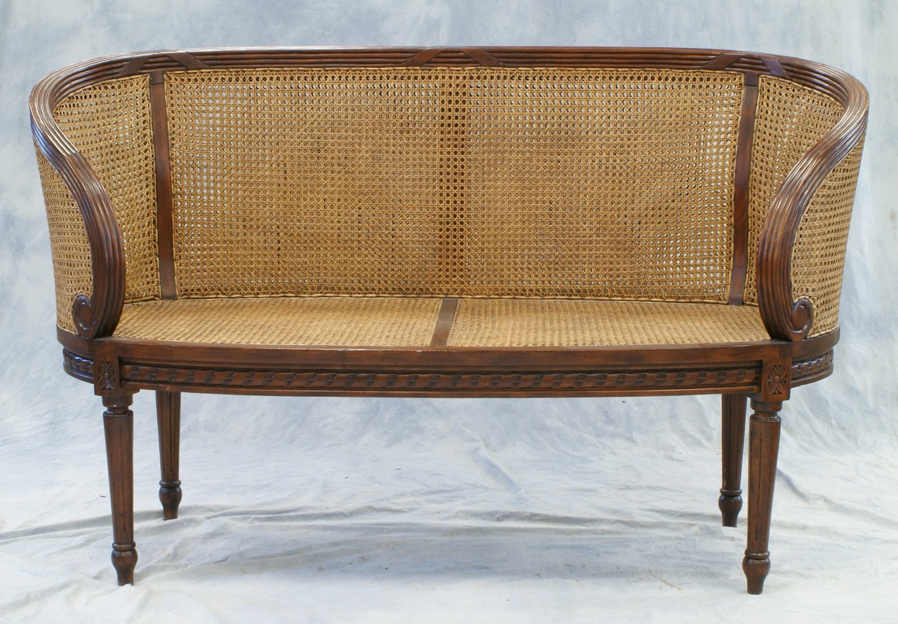 Appraisal: Louis XV style caned back and seat settee with reeded