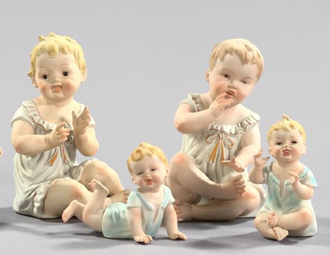 Appraisal: Group of Four Biscuit Porcelain Figures of Children first quarter