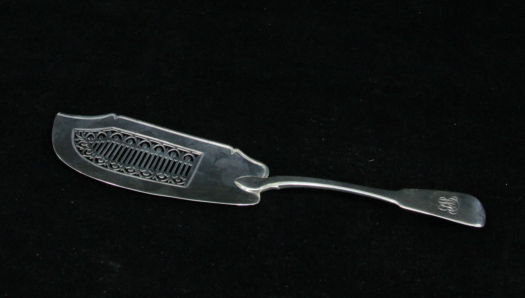 Appraisal: A George III silver fiddle pattern fish slice WC London