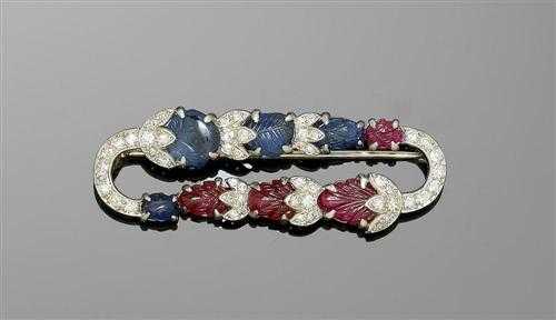 Appraisal: RUBY SAPPHIRE AND DIAMOND BROOCH CARTIER ca Platinum Decorative elliptical