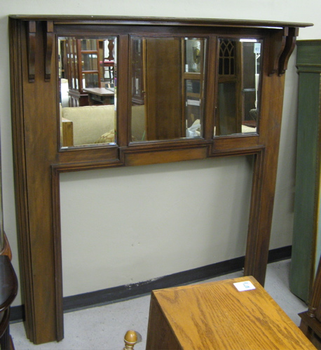 Appraisal: MAHOGANY FIREPLACE SURROUND English early th century having an open