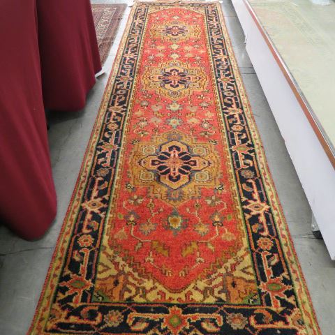 Appraisal: Heriz Persian Handmade Runner geometric designs salmon field thick pile