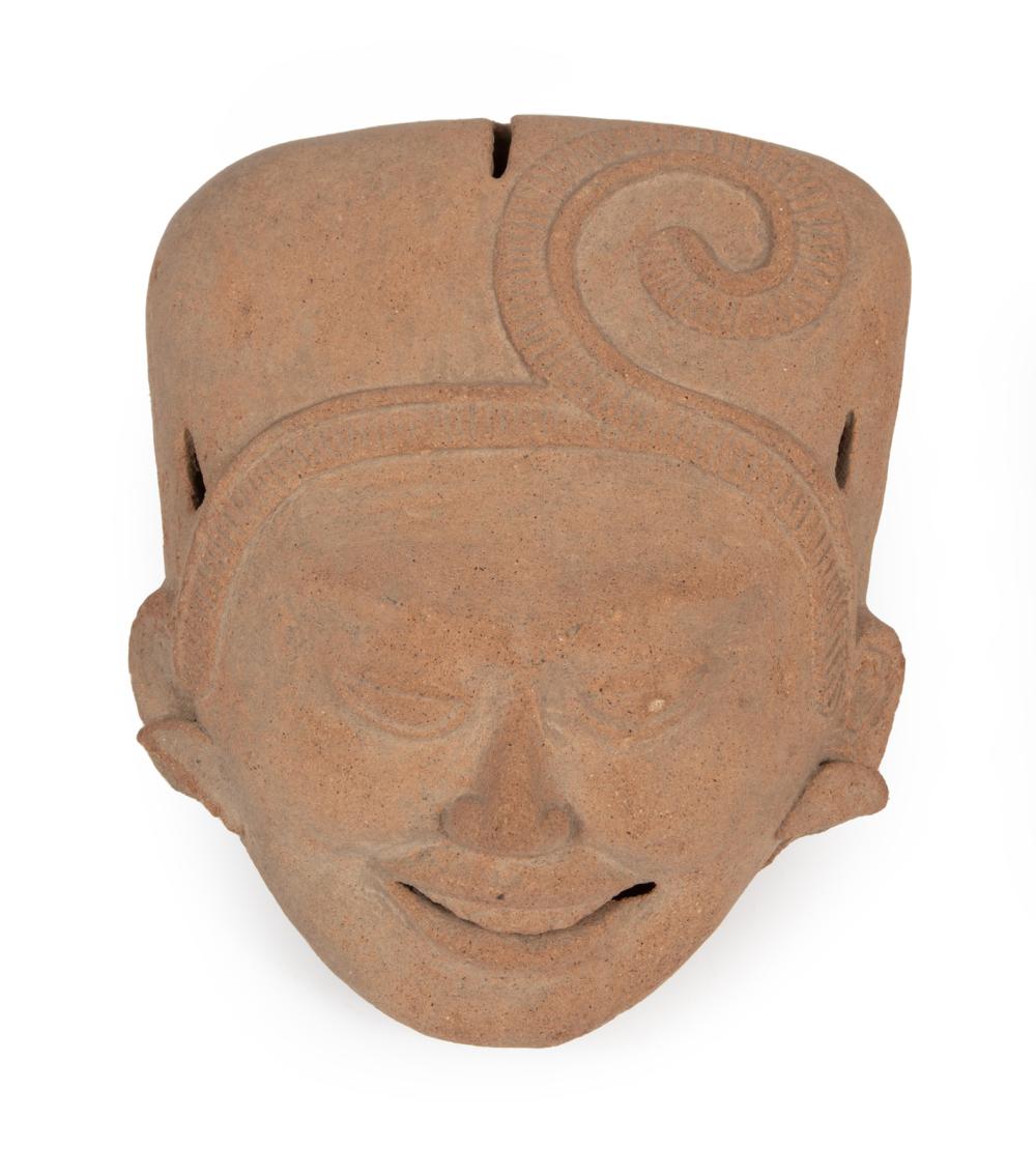 Appraisal: PRE-COLUMBIAN POTTERY SONRIENTE HEADPre-Columbian Pottery Sonriente Head Veracruz realistically modeled