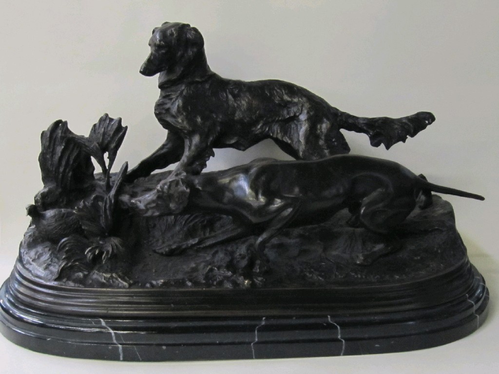 Appraisal: Large bronze figure group of two dogs chasing a bird