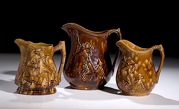 Appraisal: BENNETT KNEELING RIFLEMAN ROCKINGHAM PITCHER PLUS lot of three attributed