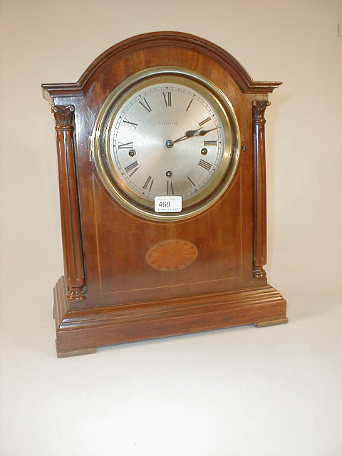 Appraisal: An Edwardian string inlaid mahogany bracket clock by Elkington with