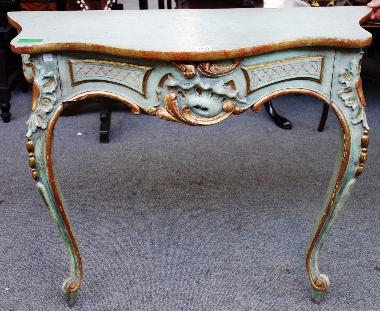 Appraisal: An th century style painted serpentine console table with single