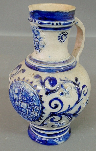 Appraisal: - German stoneware pitcher th c with extensive blue incised