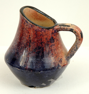 Appraisal: PREMIER POTTERY PRESTON Victoria circa Tapering earthenware jug mottled blue