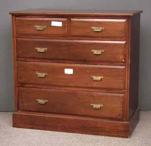 Appraisal: An Edwardian mahogany chest of drawers the drawers with bevelled