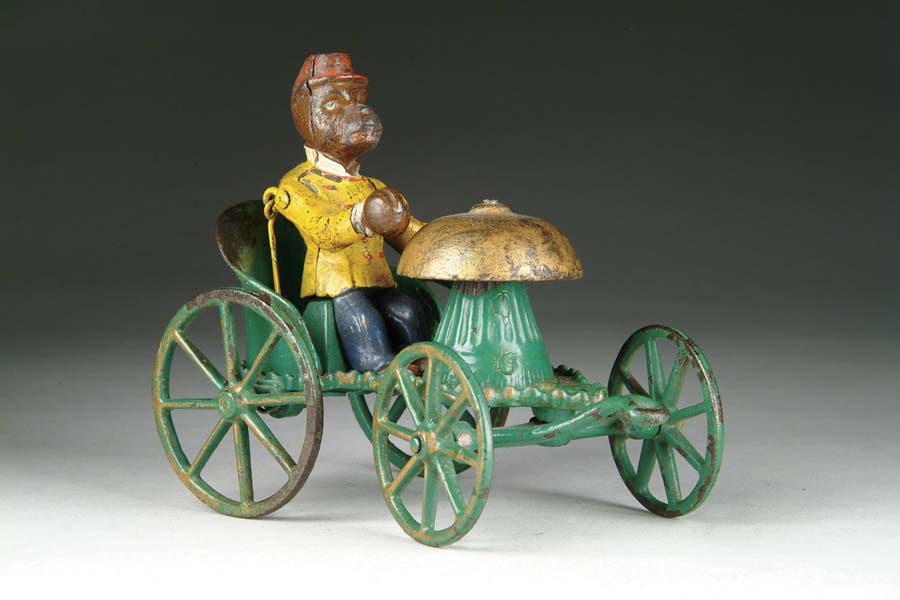 Appraisal: MONKEY CHARIOT BELL TOY Manufactured by Kyser Rex this charming