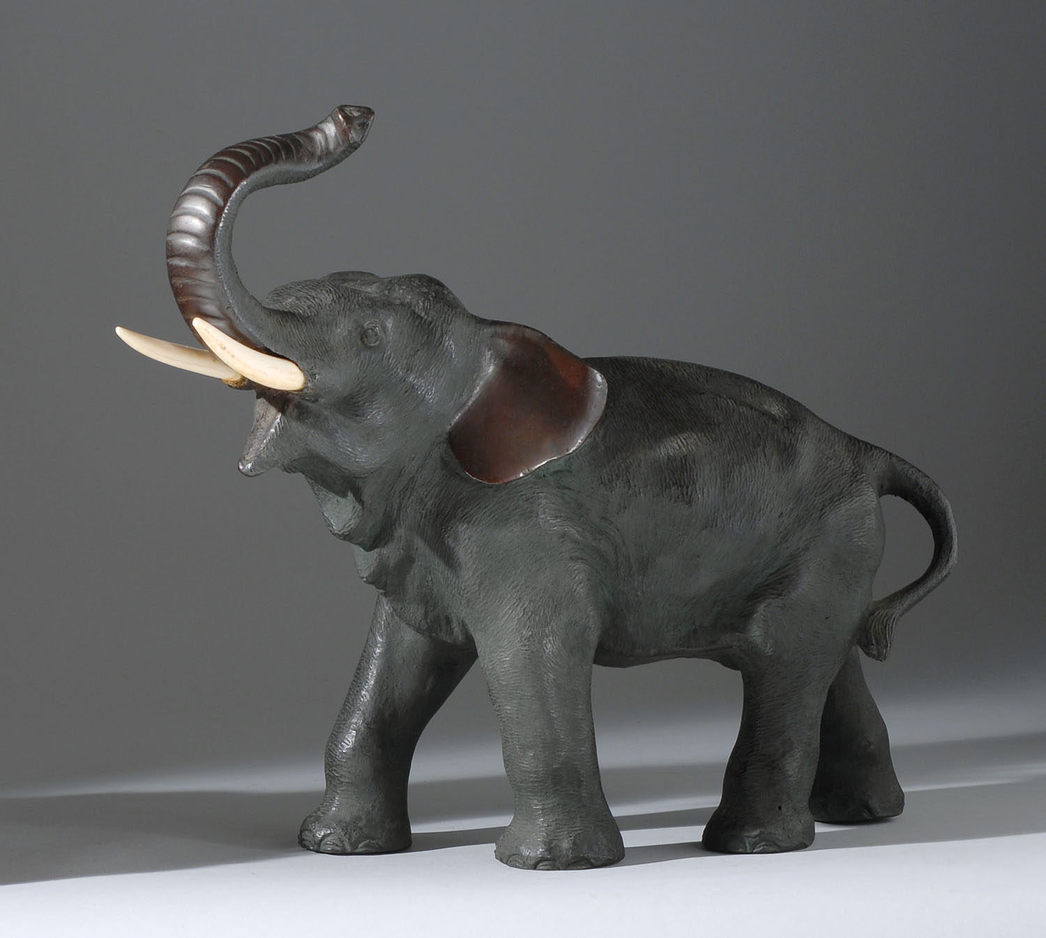 Appraisal: BRONZE FIGURE OF AN ELEPHANT Meiji PeriodIn standing position with