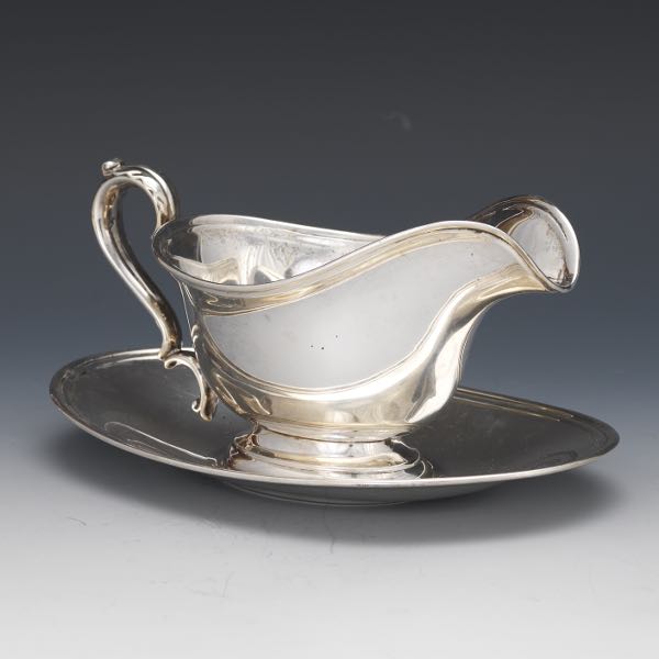 Appraisal: INTERNATIONAL STERLING GRAVY SAUCE BOAT WITH UNDERPLATE LORD SAYBROOK PATTERN