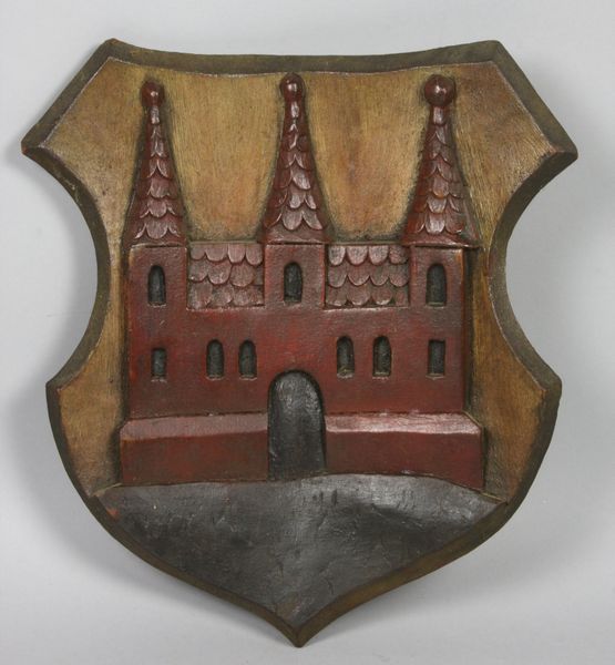 Appraisal: th- th Century English heraldic wall plaque with castle motif