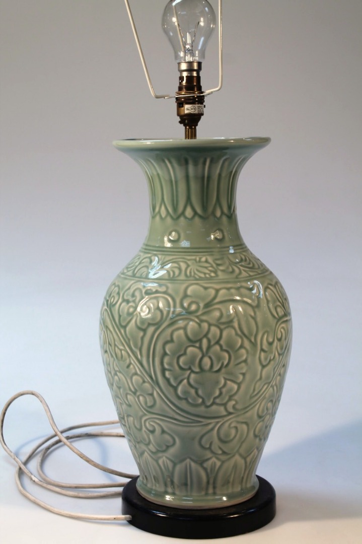 Appraisal: A thC Chinese celadon style table lamp the shouldered circular