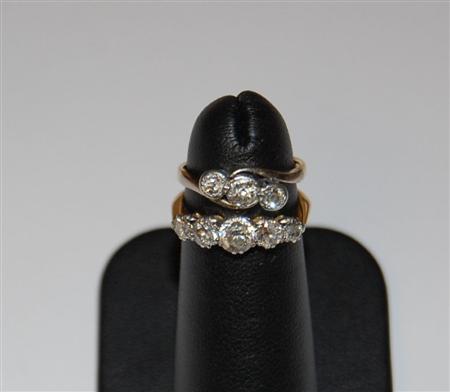 Appraisal: A five stone diamond ring of graduated form claw set