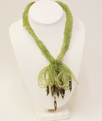 Appraisal: A Multi-strand Glass Bead Necklace having multiple braided strands of