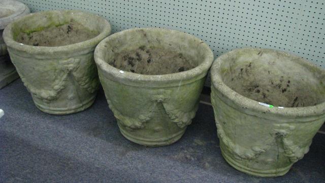 Appraisal: Three cast ornamental concrete planters inches high inches diameter with