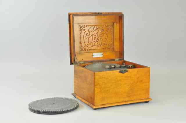 Appraisal: CRITERION MUSIC BOX Oak case incised ''Criterion'' on lid plays