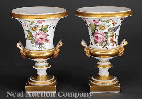 Appraisal: A Pair of French Painted Porcelain Campagna Urns c reserved