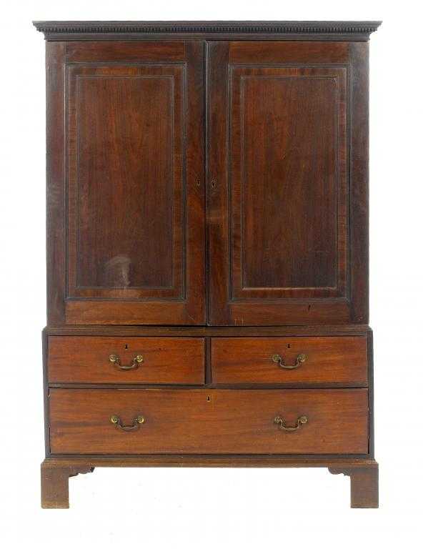 Appraisal: A GEORGE III MAHOGANY LINEN PRESS with dentil cornice the