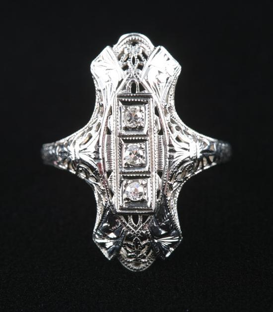 Appraisal: K WHITE GOLD AND DIAMOND RING Circa s Pierced filigree