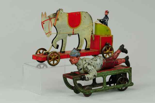 Appraisal: D P CLARK WHEELED TOYS Early pressed steel examples including