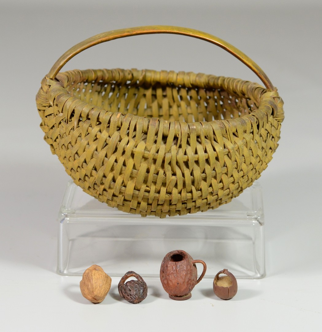 Appraisal: Mustard Painted Buttocks Basket with Carved Nuts l x h