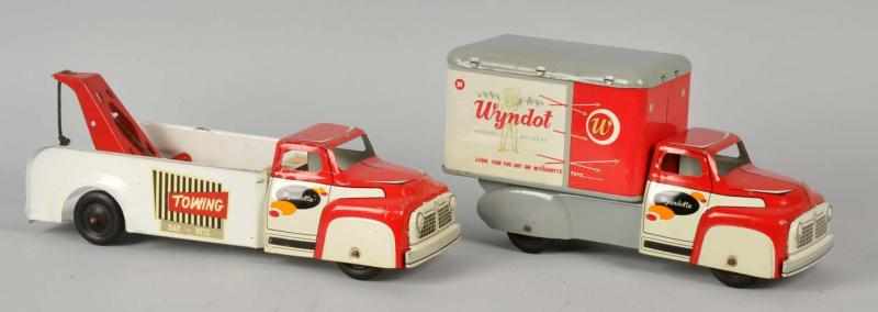 Appraisal: Lot of Pressed Steel Wyandotte Truck Toys American Includes one