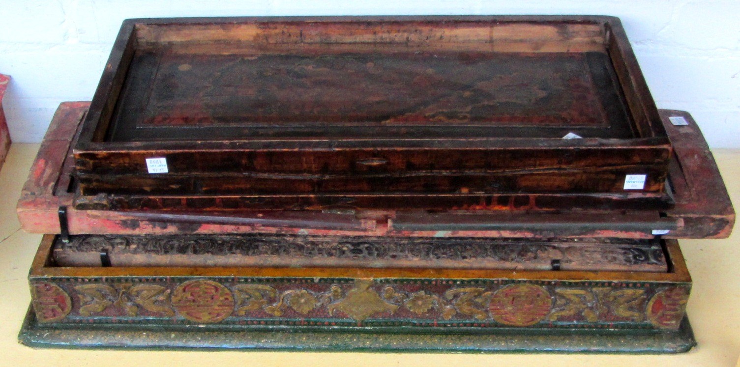 Appraisal: A South East Asian carved wooden panel detailed with buddhistic