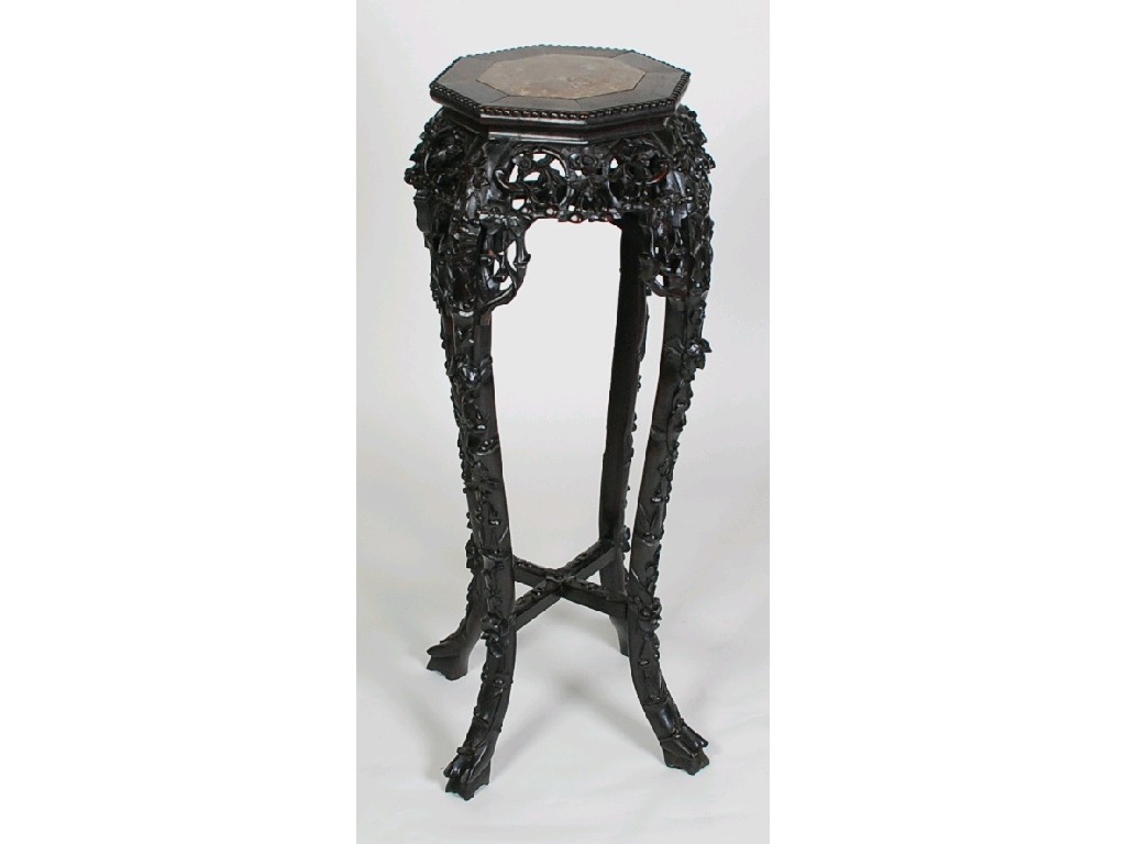 Appraisal: CHINESE CARVED HARDWOOD TALL JARDINIERE STAND the octagonal top with