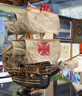 Appraisal: Polychrome decorated ship model Polychrome decorated ship model titled Roland