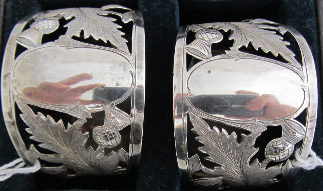 Appraisal: A pair of silver napkin rings each engraved and pierced