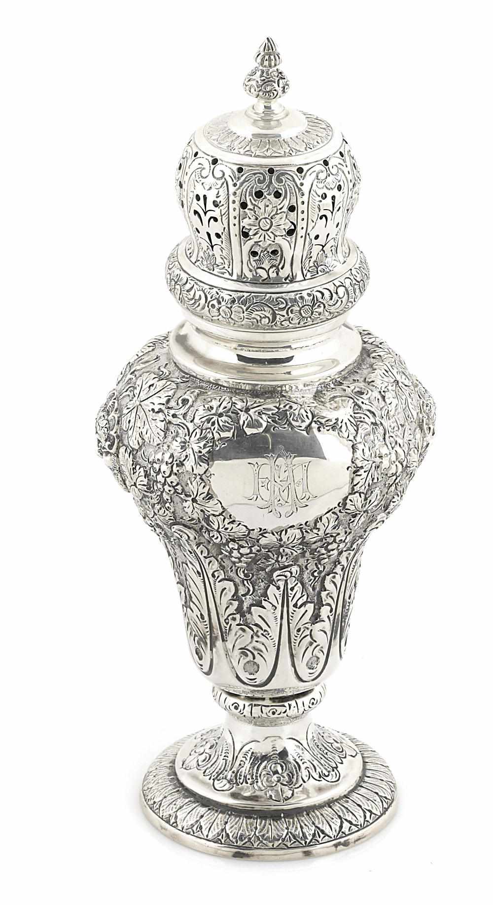 Appraisal: Property of Various Owners A Victorian sterling silver foliate-repousse-decorated muffineer