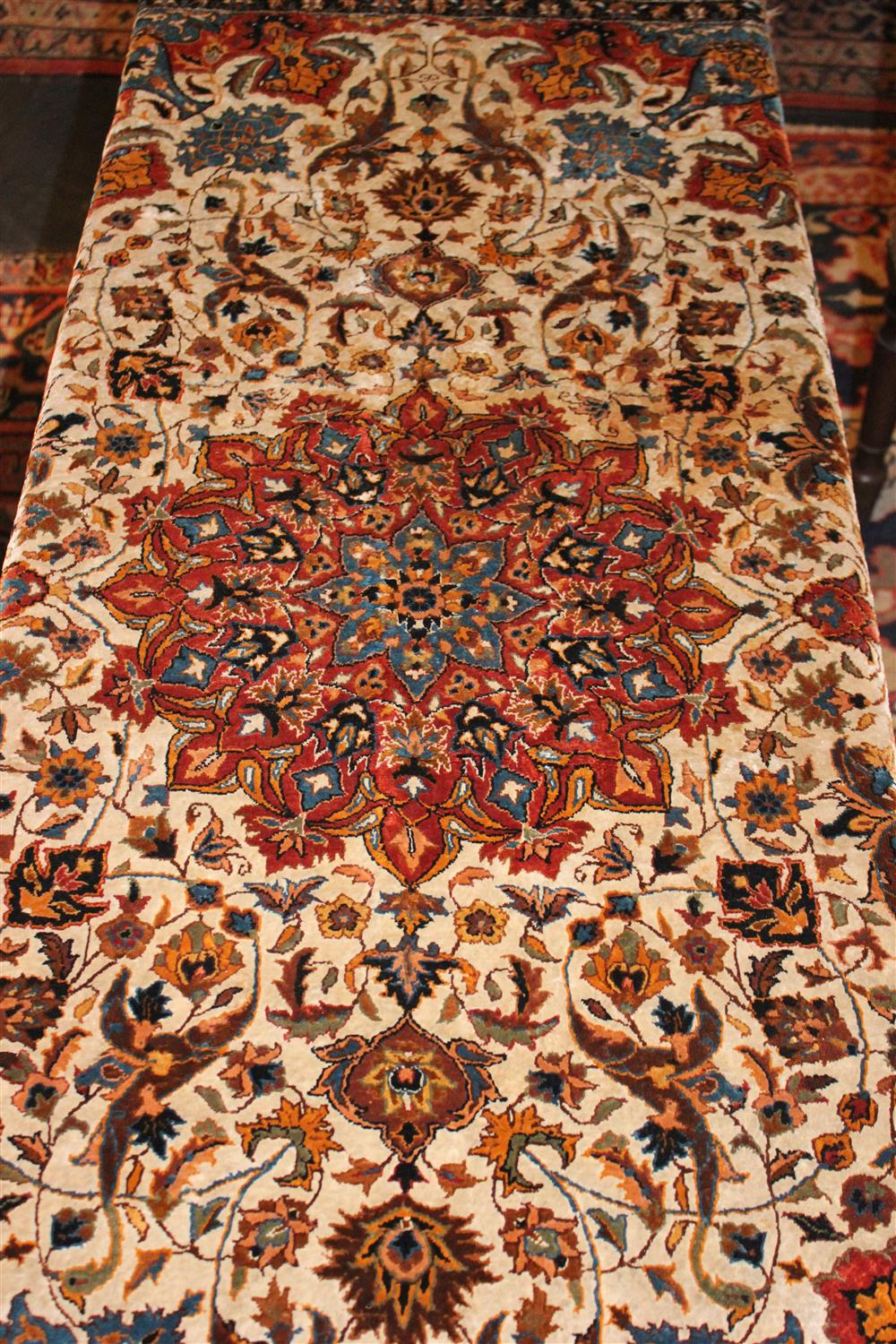 Appraisal: PERSIAN FINELY WOVEN QUM SILK RUG orange rust blues black