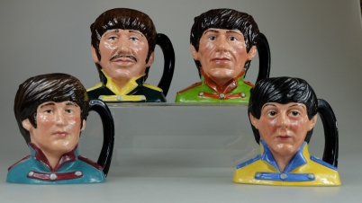 Appraisal: Royal Doulton intermediate character jugs of The Beatles comprising of