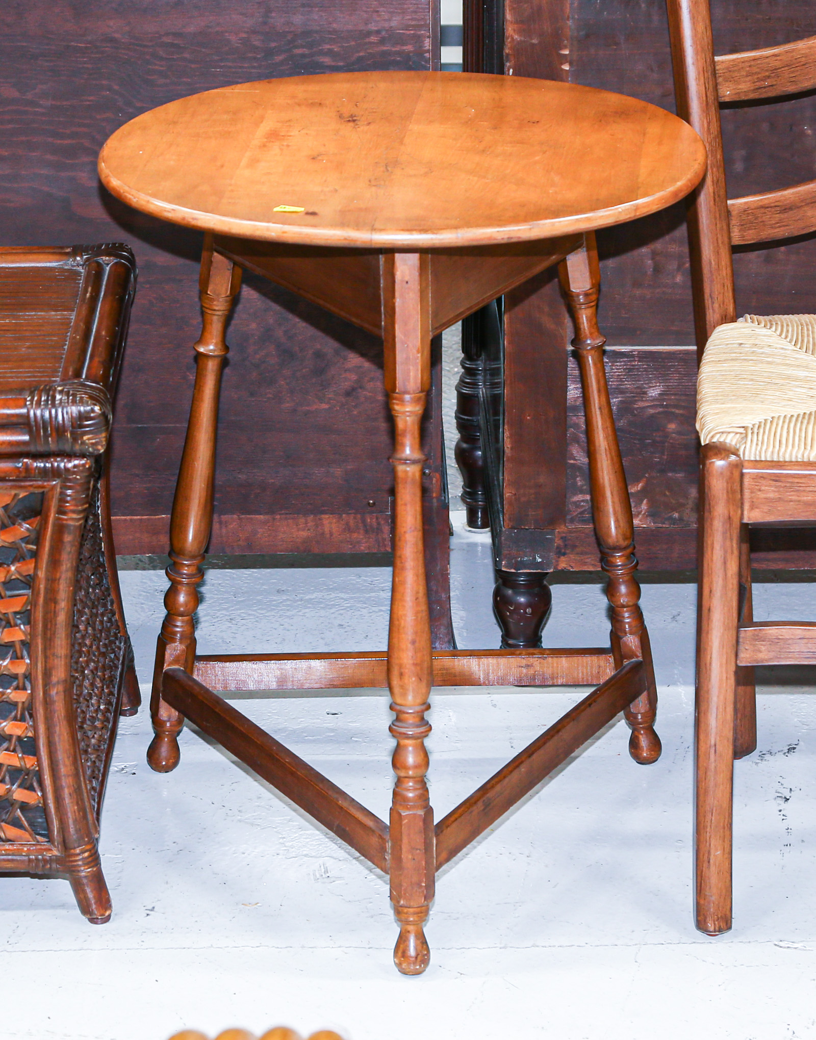 Appraisal: ENGLISH VERNACULAR STYLE CRICKET TABLE th century turned three-leg base