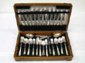 Appraisal: An Oak cased canteen of silver plated flatware comprising four