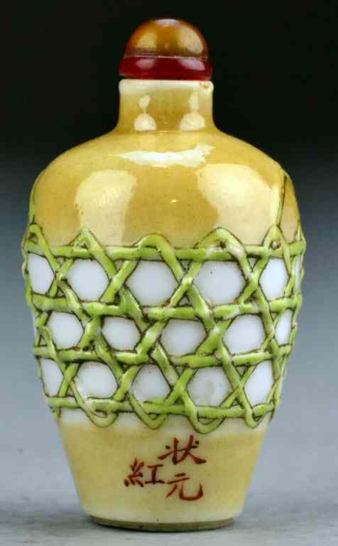 Appraisal: Chinese Qing Molded Porcelain Snuff BottleWith raised weaved basket design