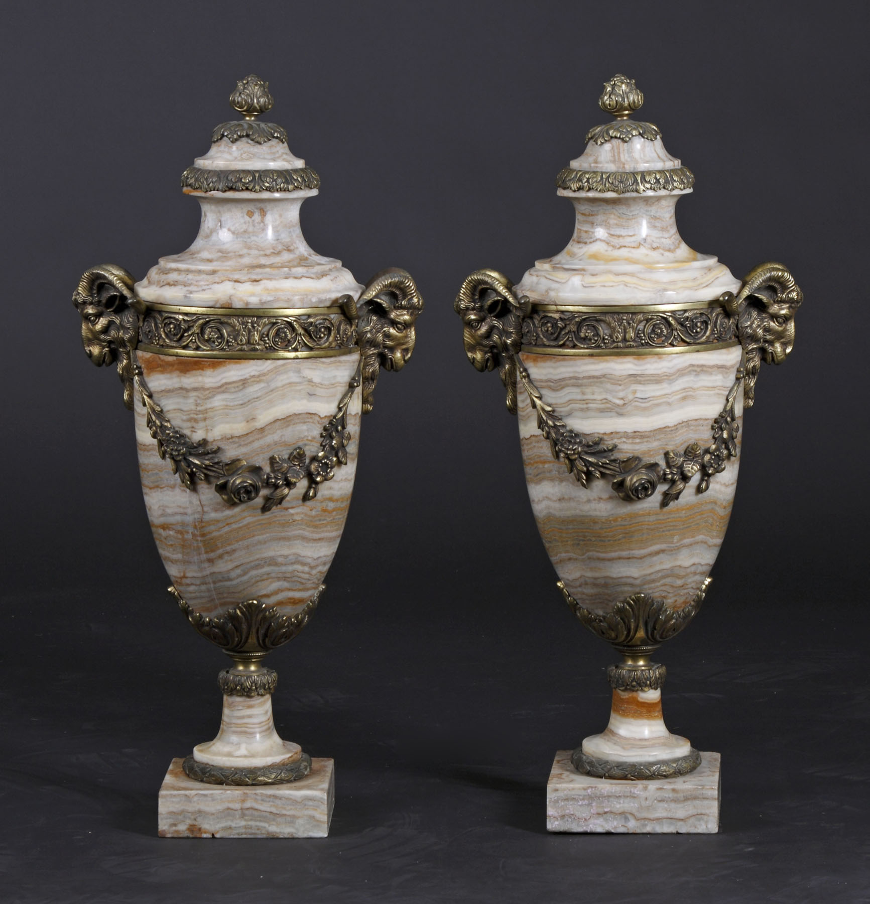 Appraisal: Pair of Marble Urns w Bronze Mounts Rams heads garland