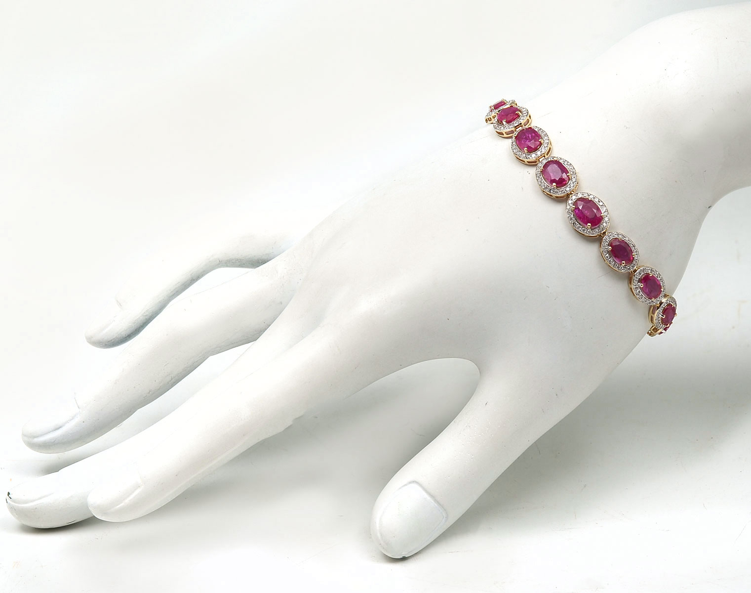 Appraisal: K CTW RUBY DIAMOND BRACELET K yellow gold bracelet is