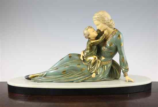 Appraisal: An Art Deco painted spelter and ivory figure of a