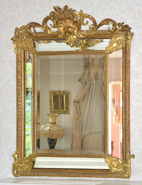 Appraisal: A TH CENTURY FRENCH GILT CUSHION FRAME WALL MIRROR with