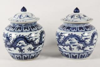 Appraisal: PAIR OF CHINESE PORCELAIN BULBOUS CAPPED JARS WITH DRAGON DECORATED