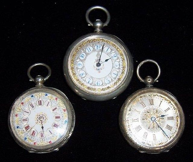 Appraisal: A lady's open faced pocket watch with gilded floral decoration