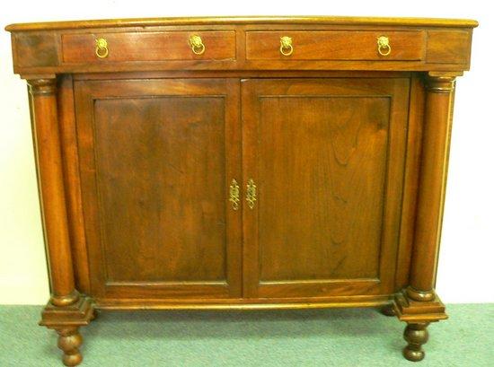 Appraisal: A mahogany side cabinet of Empire design having turned columns