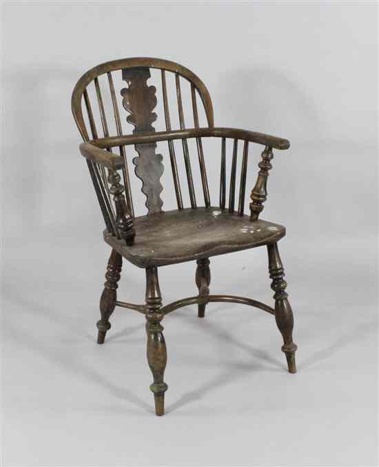 Appraisal: A th century yew ash and elm Windsor chair with