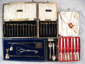 Appraisal: Eighteen silver cocktail sticks in two cases a set of