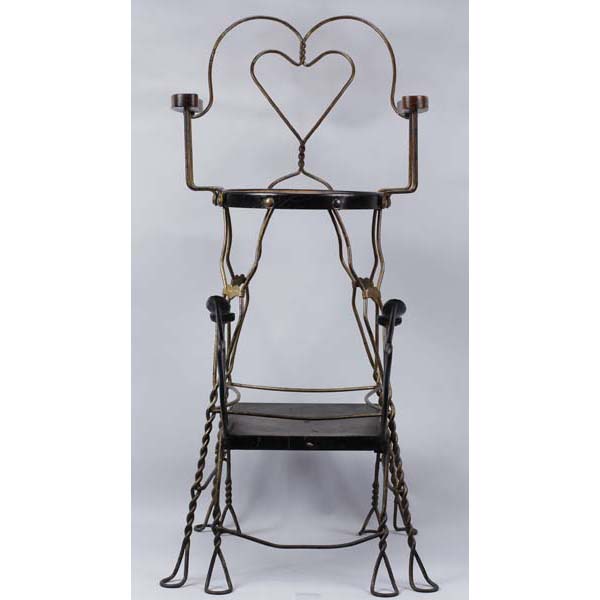 Appraisal: Twisted wire shoe shine chair stool shoeshining stand manufactured by