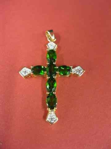 Appraisal: Tsavarite Garnet Diamond Cross six oval gems and four diamonds